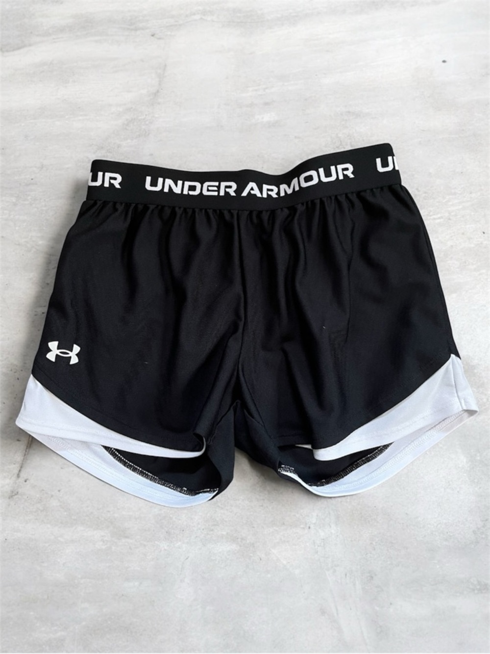 Under Armour • Youth • Black Athletic Performance Shorts with White Logo